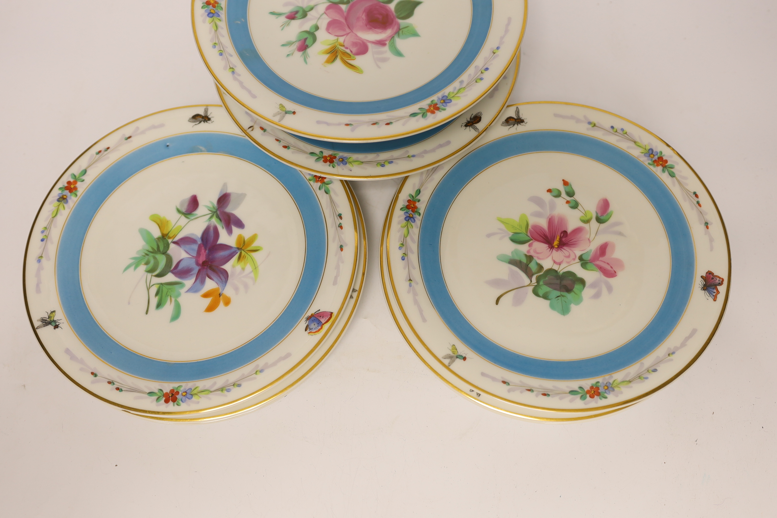 A French mid 19th century floral dessert set, with six plates and two pedestal dishes